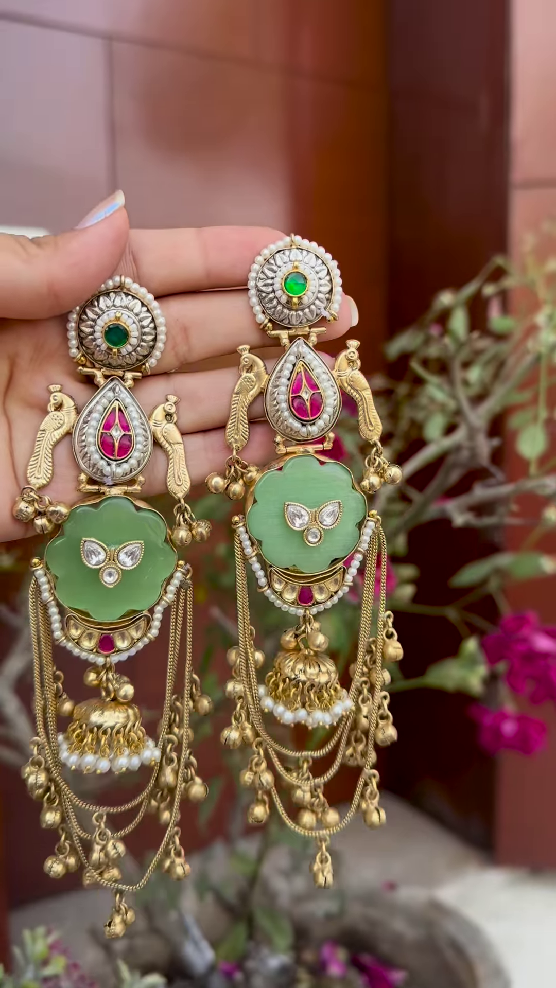 Opulent Gold-Toned Jhumka Earrings with Kundan, Gemstones, and Pearl Details