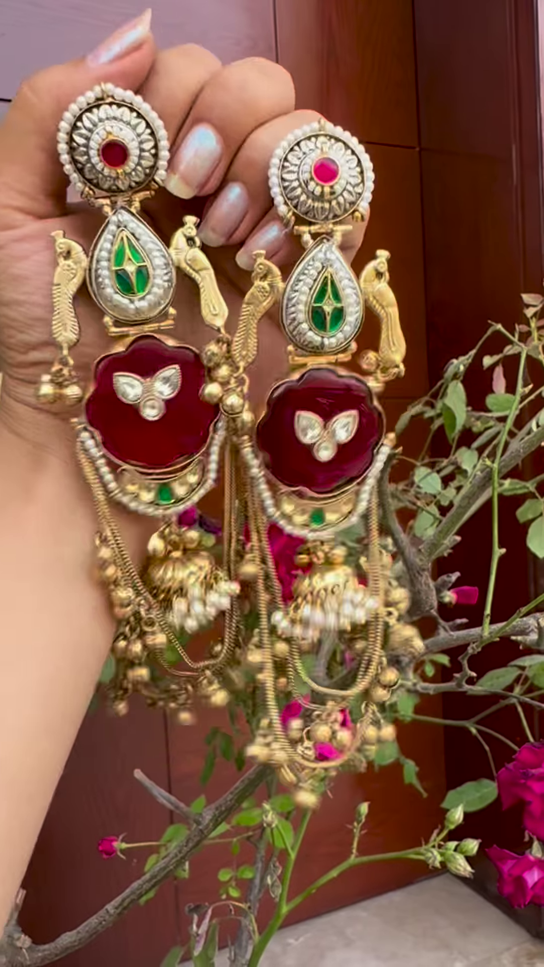 Opulent Gold-Toned Jhumka Earrings with Kundan, Gemstones, and Pearl Details