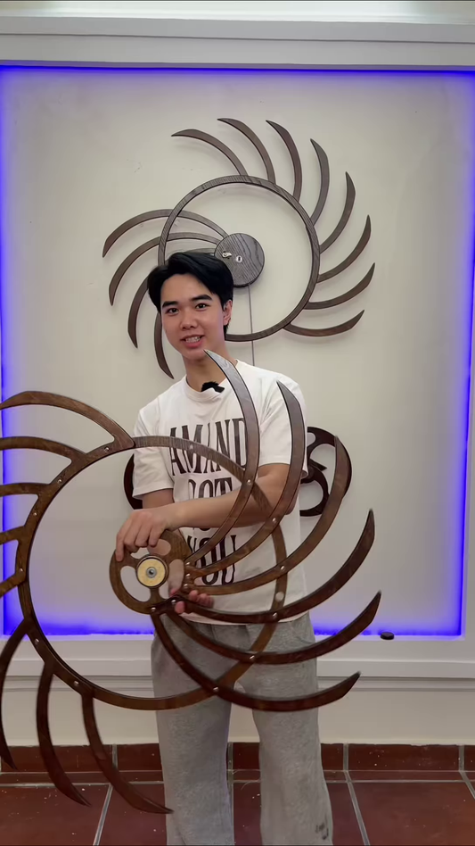 Intricate Kinetic Wall Sculpture with Moving Gears and Abstract Design