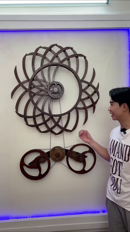 Intricate Kinetic Wall Sculpture with Moving Gears and Abstract Design