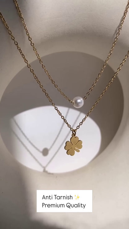 Delicate Layered Gold-Toned Necklace with Four-Leaf Clover and Pearl Pendants