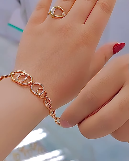 Elegant Rose Gold Tone Jewelry Set with Interlocking Circle Design and Sparkling Accents