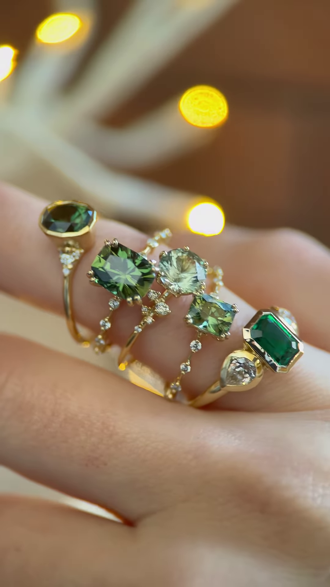 Exquisite Green Gemstone Rings in Gold-Toned Settings with Dazzling Accents