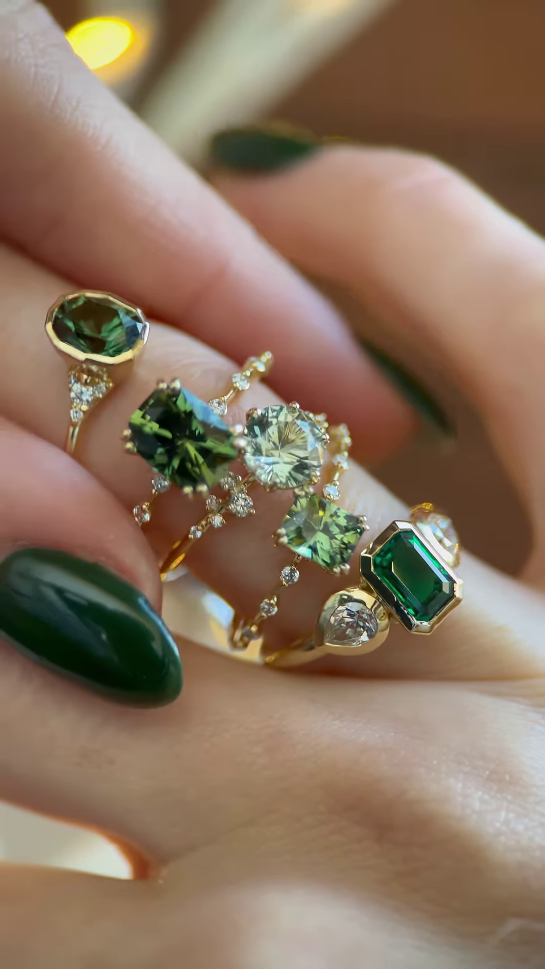 Exquisite Green Gemstone Rings in Gold-Toned Settings with Dazzling Accents