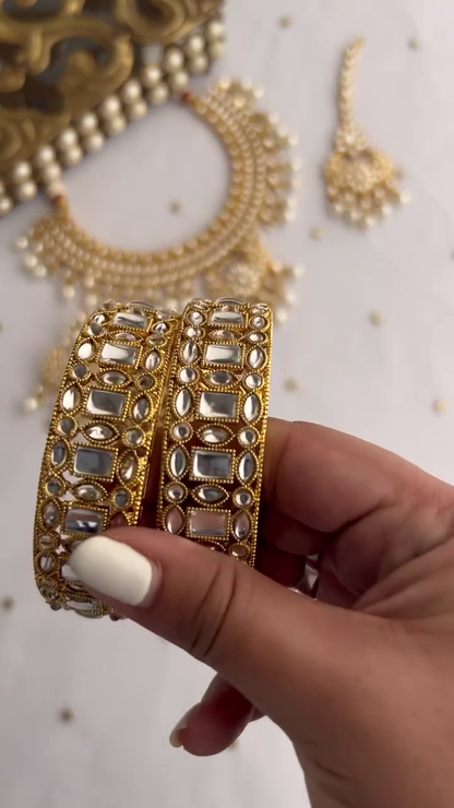 Elegant Gold-Toned Kundan Necklace Set with Pearl Drops