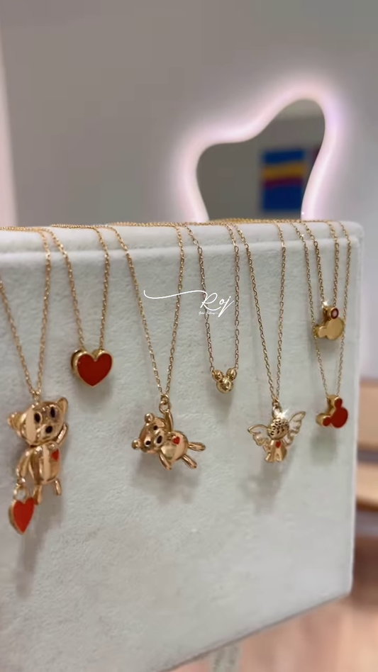 Elegant Gold-Toned Necklaces with Animal Pendants