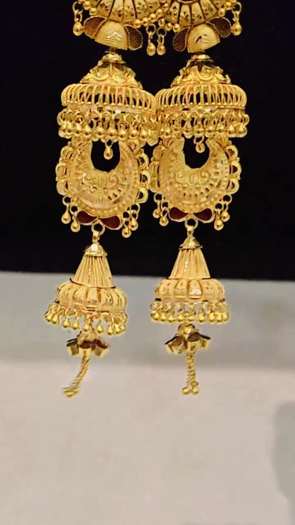 Ornate Gold-Toned Jhumka Earrings with Traditional Filigree and Red Accents