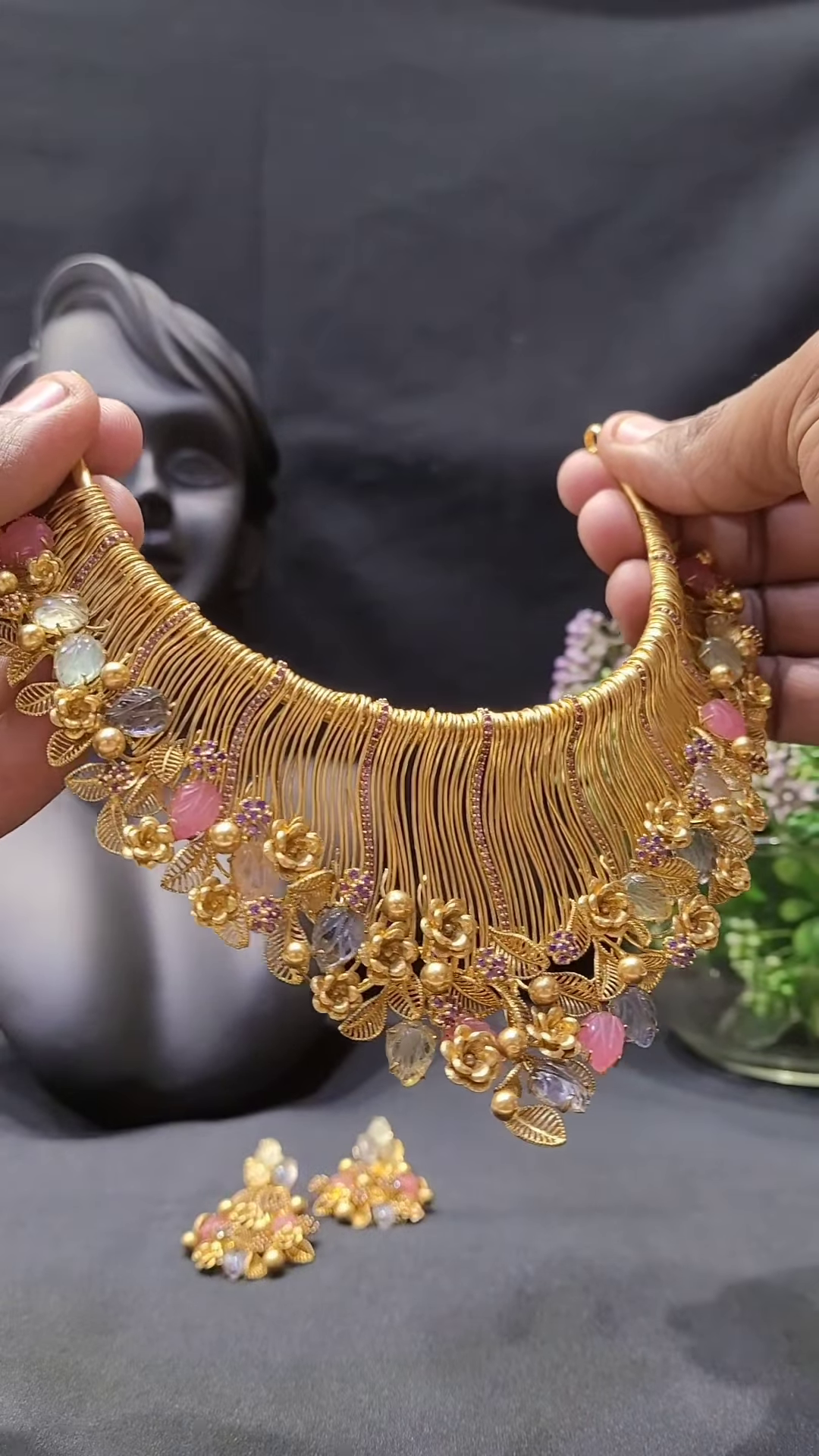 Ornate Gold-Toned Statement Necklace with Multi-Colored Gemstones and Floral Accents