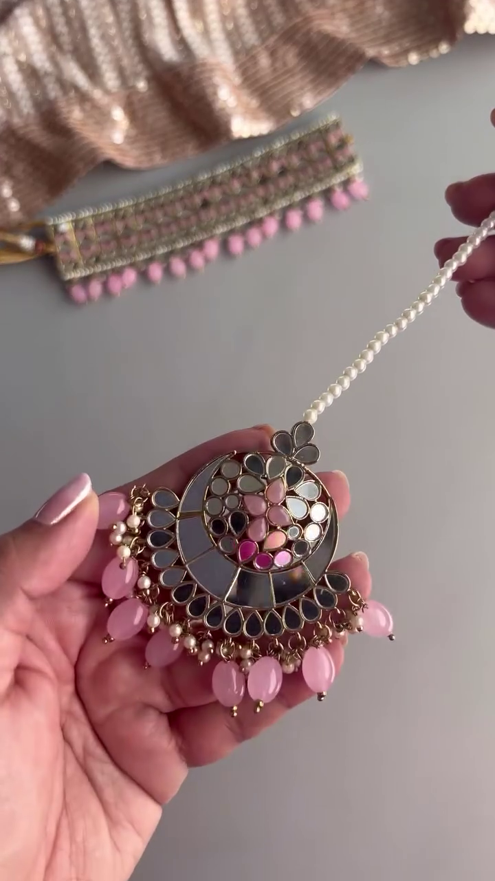 Elegant Silver-Toned Choker Jewelry Set with Pink Beaded Drops and Matching Maang Tikka & Earrings