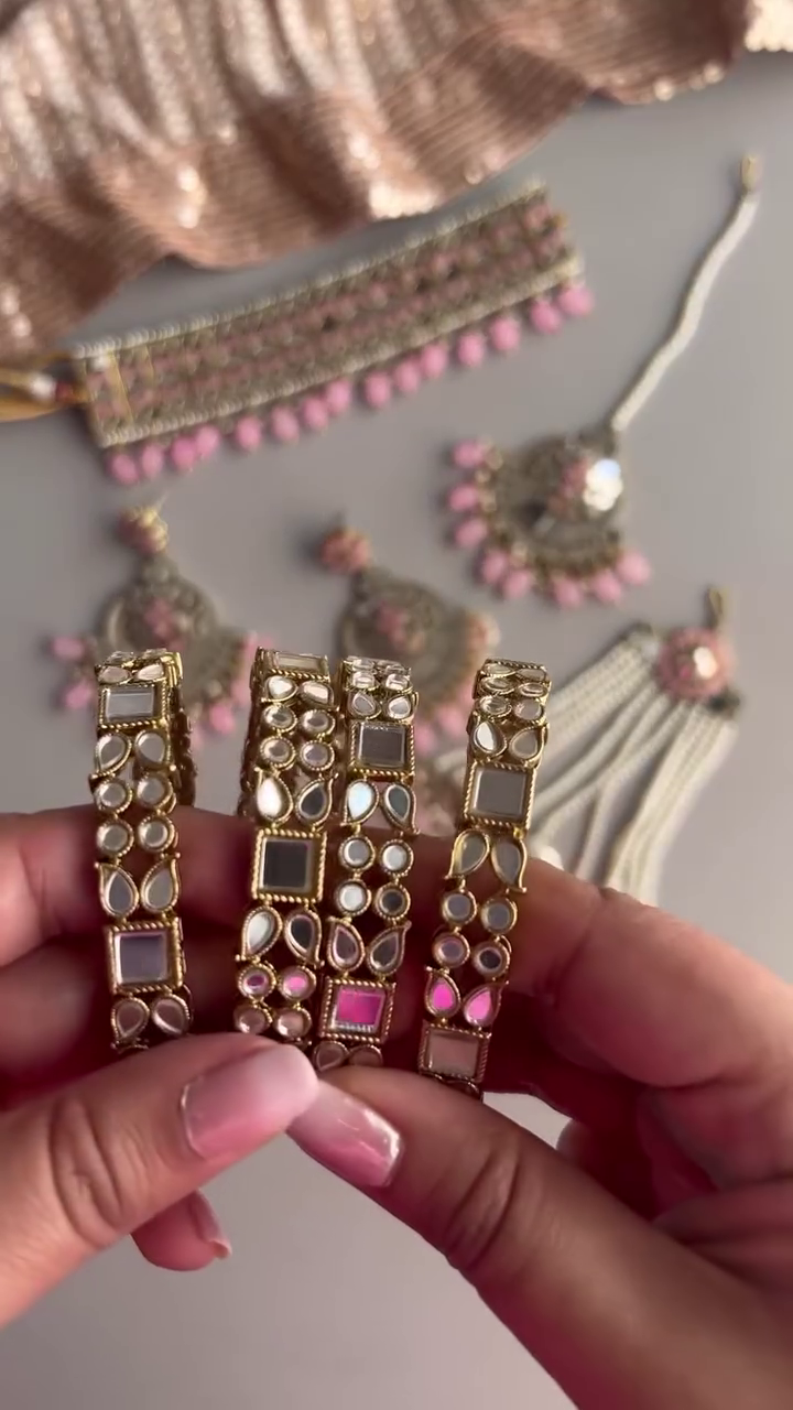 Elegant Silver-Toned Choker Jewelry Set with Pink Beaded Drops and Matching Maang Tikka & Earrings