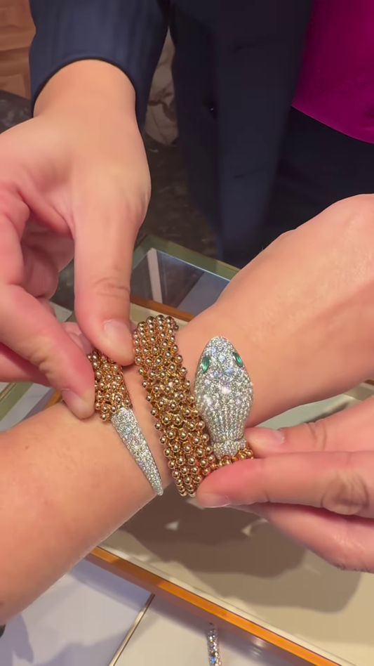 Exotic Rose Gold-Toned Coiled Snake Bracelet with Dazzling Clear Gemstones and Emerald-Inspired Eyes